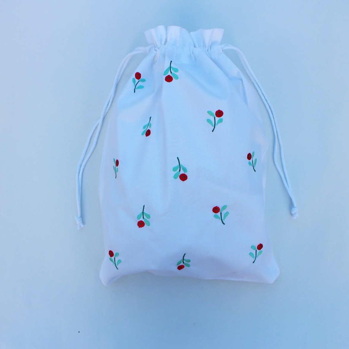 Flower embroidered laundry bag